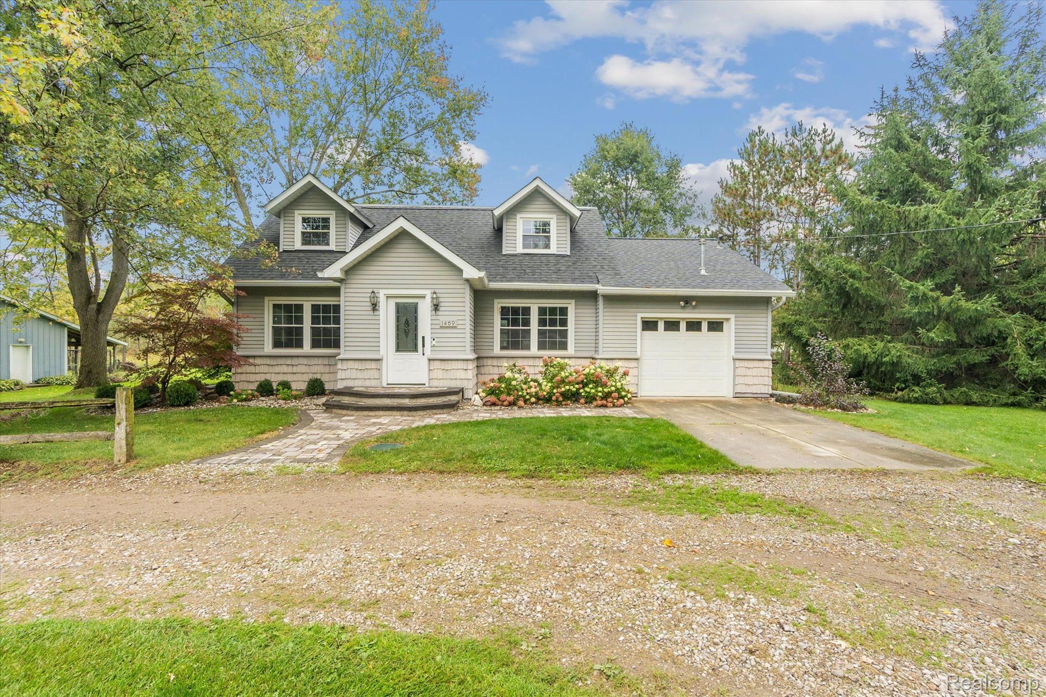 1469 Swarthout Road Pinckney, MI 48169 - Photo 1 of 43 Front of home
