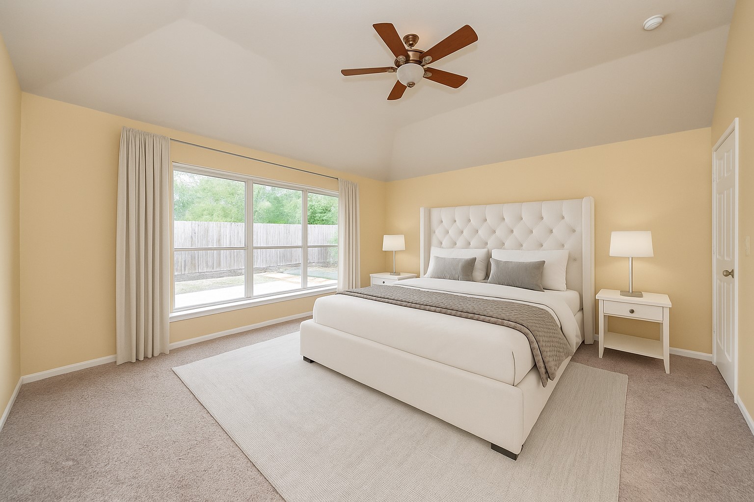 20011 Rosswood Lane Spring, TX 77388 - Photo 16 of 26 a spacious bedroom with a large bed and a large window
