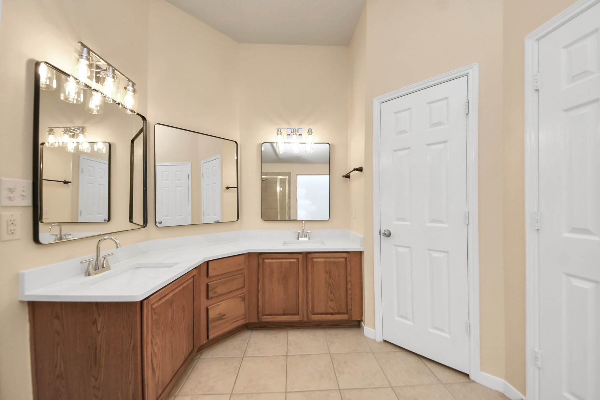 20011 Rosswood Lane Spring, TX 77388 - Photo 17 of 26 a bathroom with a sink and a mirror