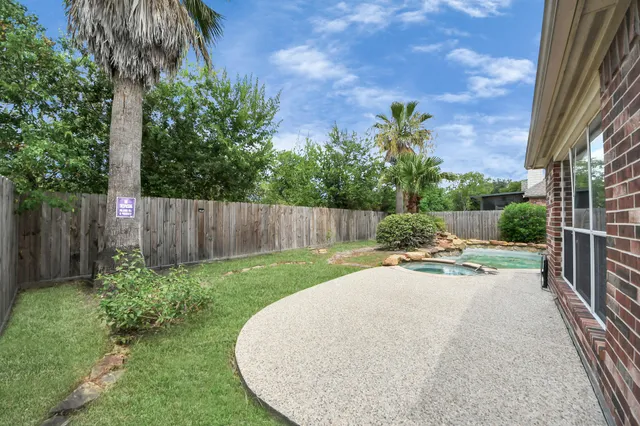 a view of a backyard with a garden