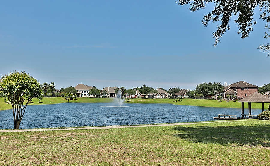 20011 Rosswood Lane Spring, TX 77388 - Photo 26 of 26 a view of a lake with a big yard
