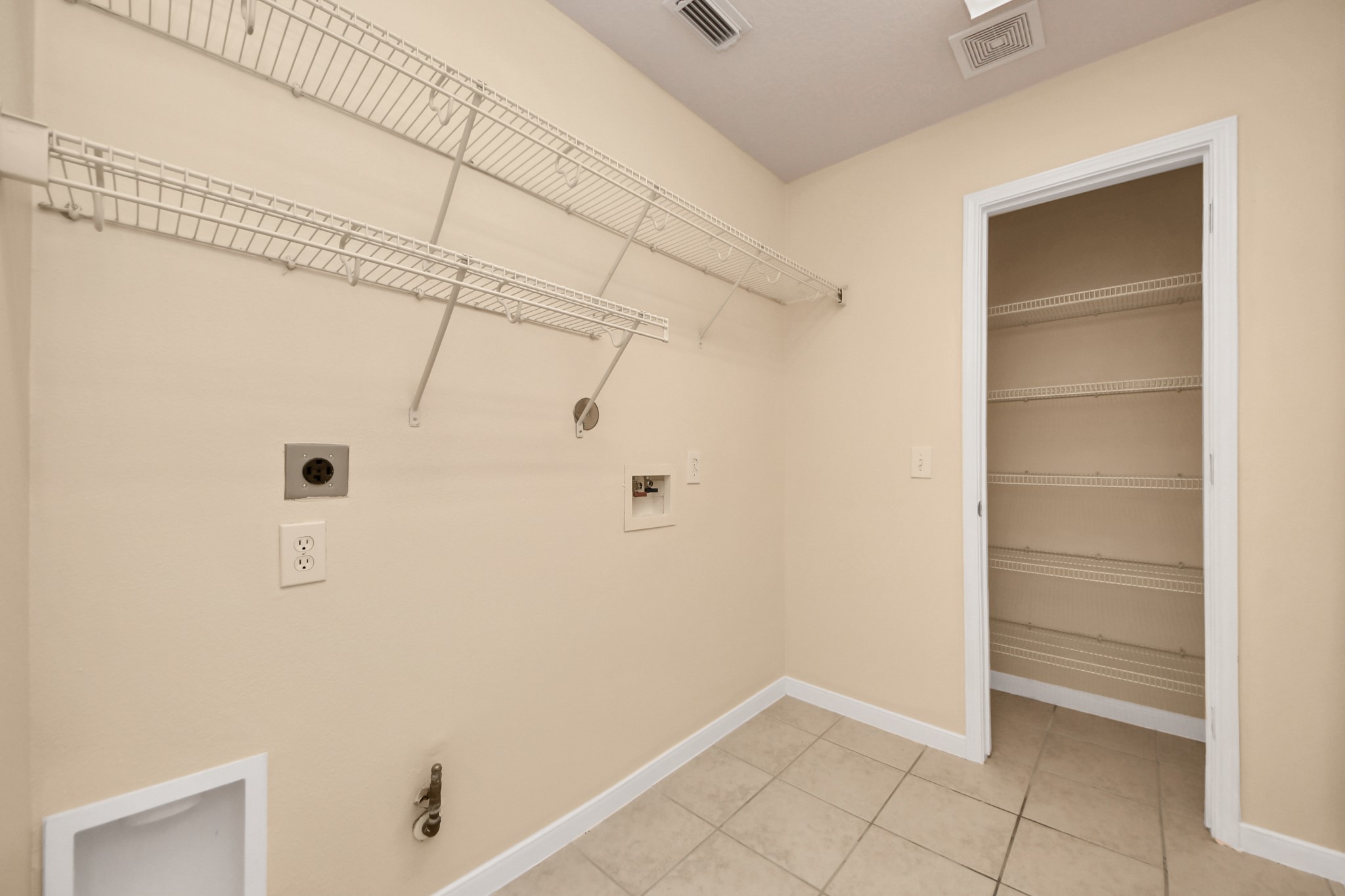 20011 Rosswood Lane Spring, TX 77388 - Photo 10 of 26 a view of walk in closet with empty racks