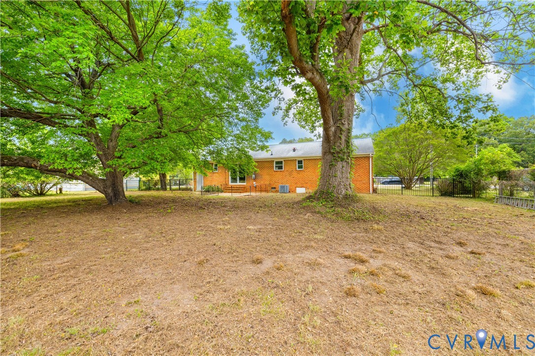 2713 Irwin Road Prince George, VA 23875 - Photo 18 of 26 a view of backyard of green space