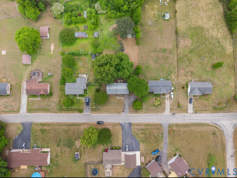 2713 Irwin Road Prince George, VA 23875 - Photo 23 of 26 an aerial view of residential house with outdoor space and swimming pool