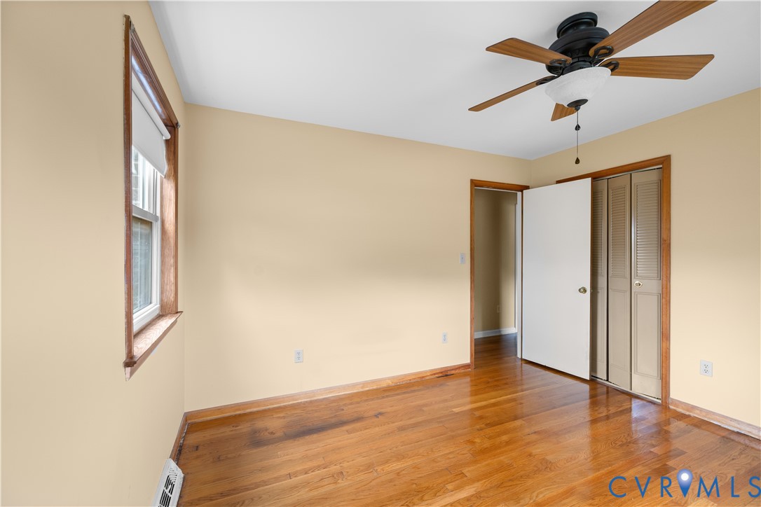 2713 Irwin Road Prince George, VA 23875 - Photo 5 of 26 a view of a room with wooden floor and white walls