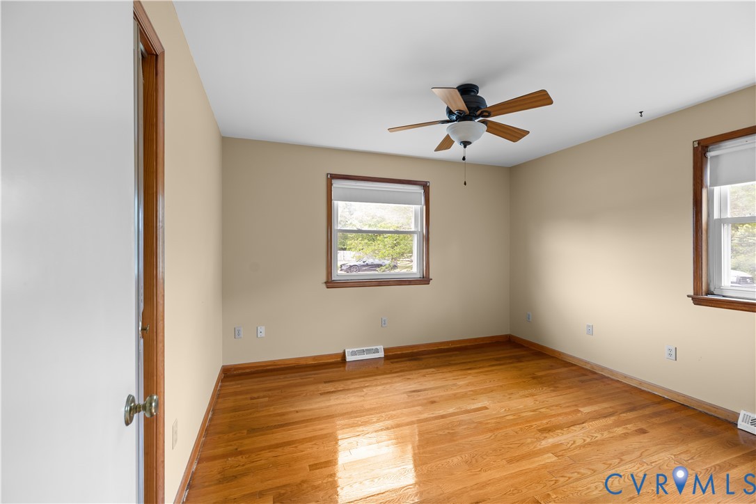 2713 Irwin Road Prince George, VA 23875 - Photo 6 of 26 a view of an empty room with a window