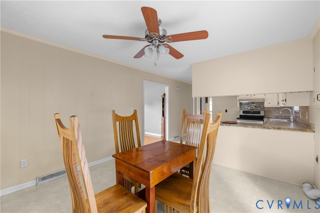 2713 Irwin Road Prince George, VA 23875 - Photo 8 of 26 a view of a dining room with furniture