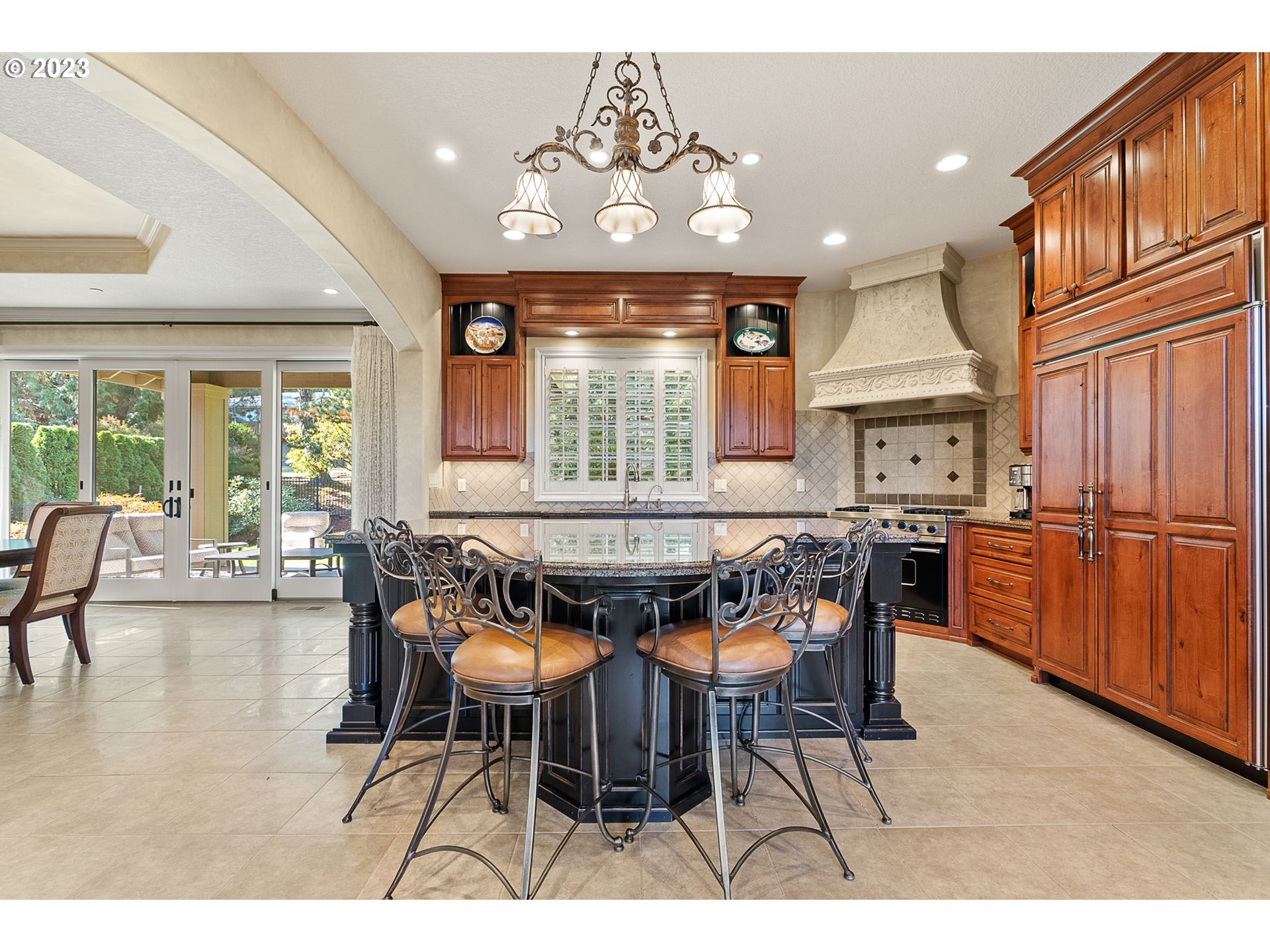 693 Southwest 68th Terrace Portland, OR 97225 - Photo 16 of 48 a dining room with furniture a chandelier and wooden floor