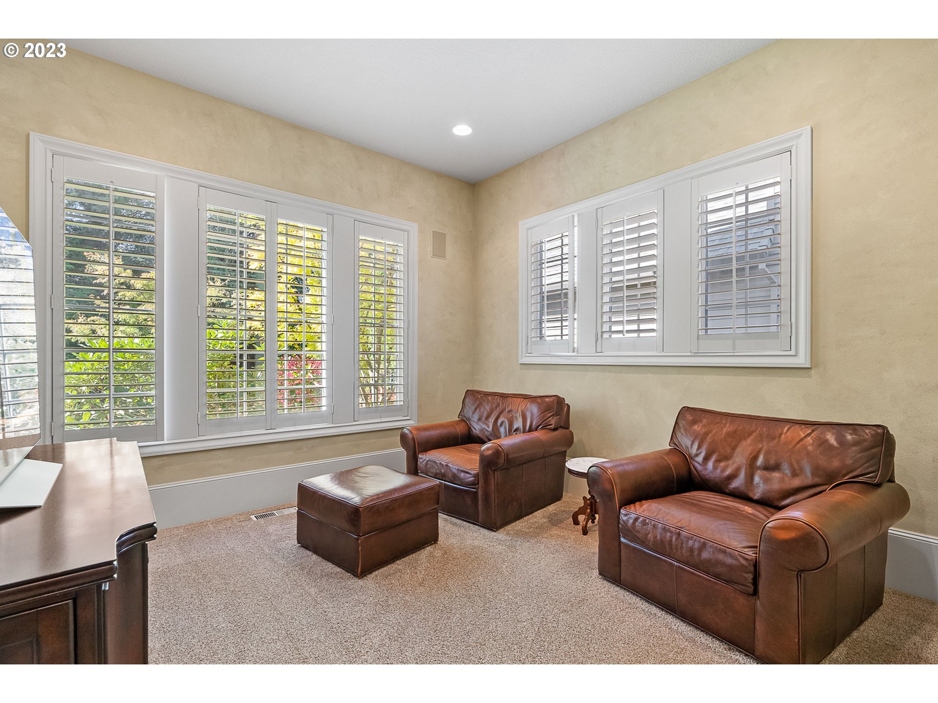 693 Southwest 68th Terrace Portland, OR 97225 - Photo 23 of 48 a living room with furniture and a window