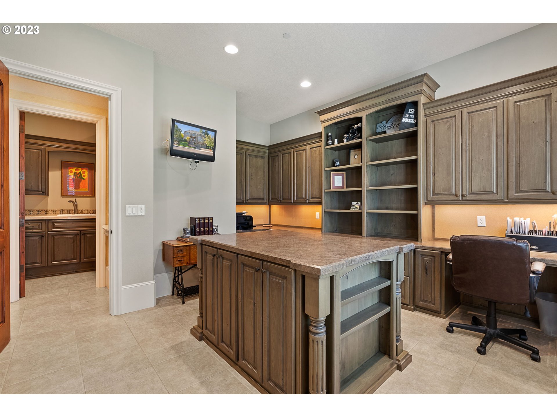 693 Southwest 68th Terrace Portland, OR 97225 - Photo 25 of 48 a kitchen with a stove a refrigerator and a dining table