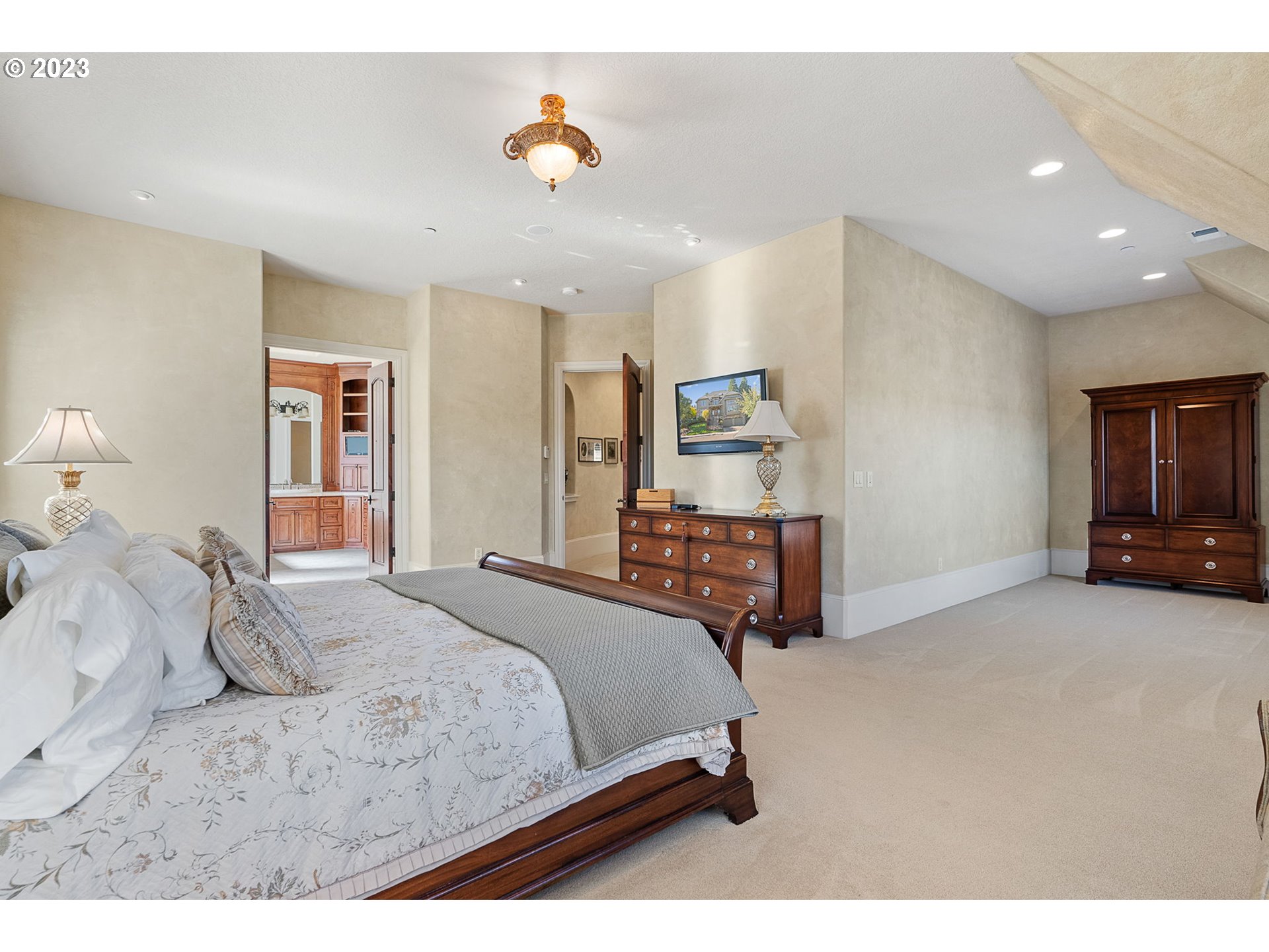 693 Southwest 68th Terrace Portland, OR 97225 - Photo 30 of 48 a bedroom with a bed and dresser