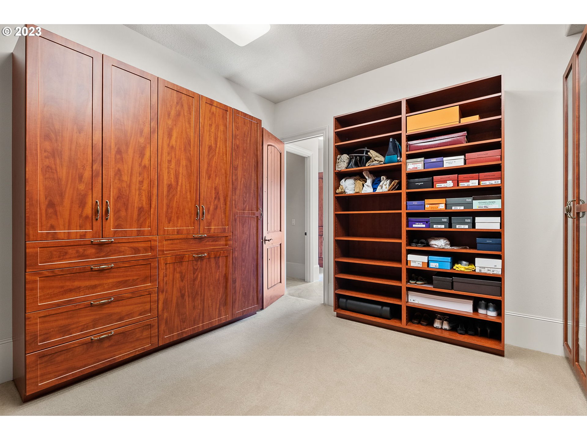 693 Southwest 68th Terrace Portland, OR 97225 - Photo 34 of 48 a view of walk in closet with empty racks