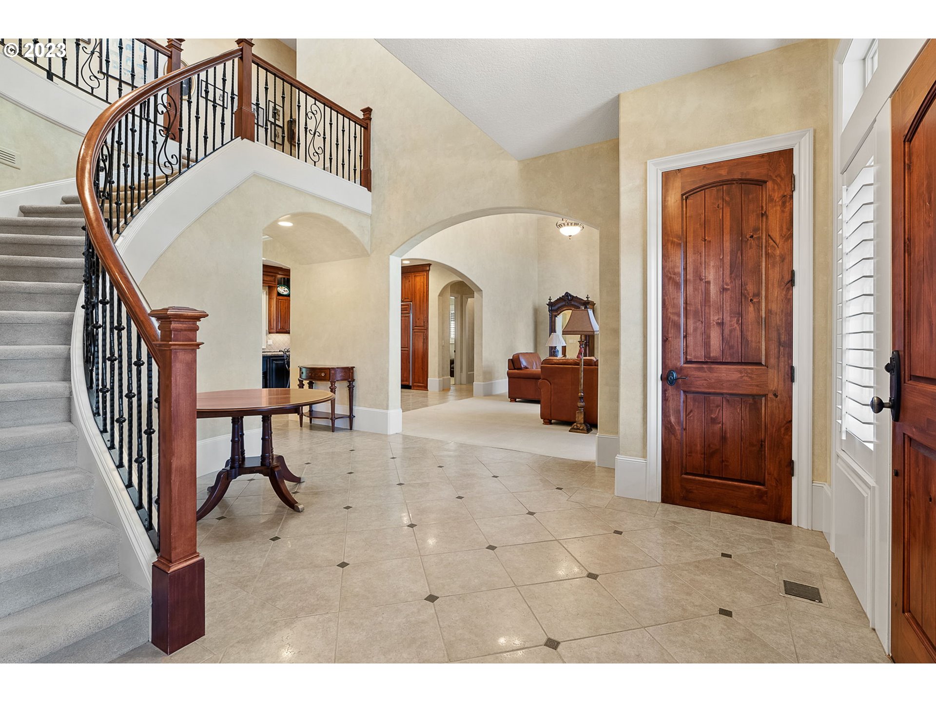 693 Southwest 68th Terrace Portland, OR 97225 - Photo 4 of 48 a view of living room kitchen with furniture and a chandelier