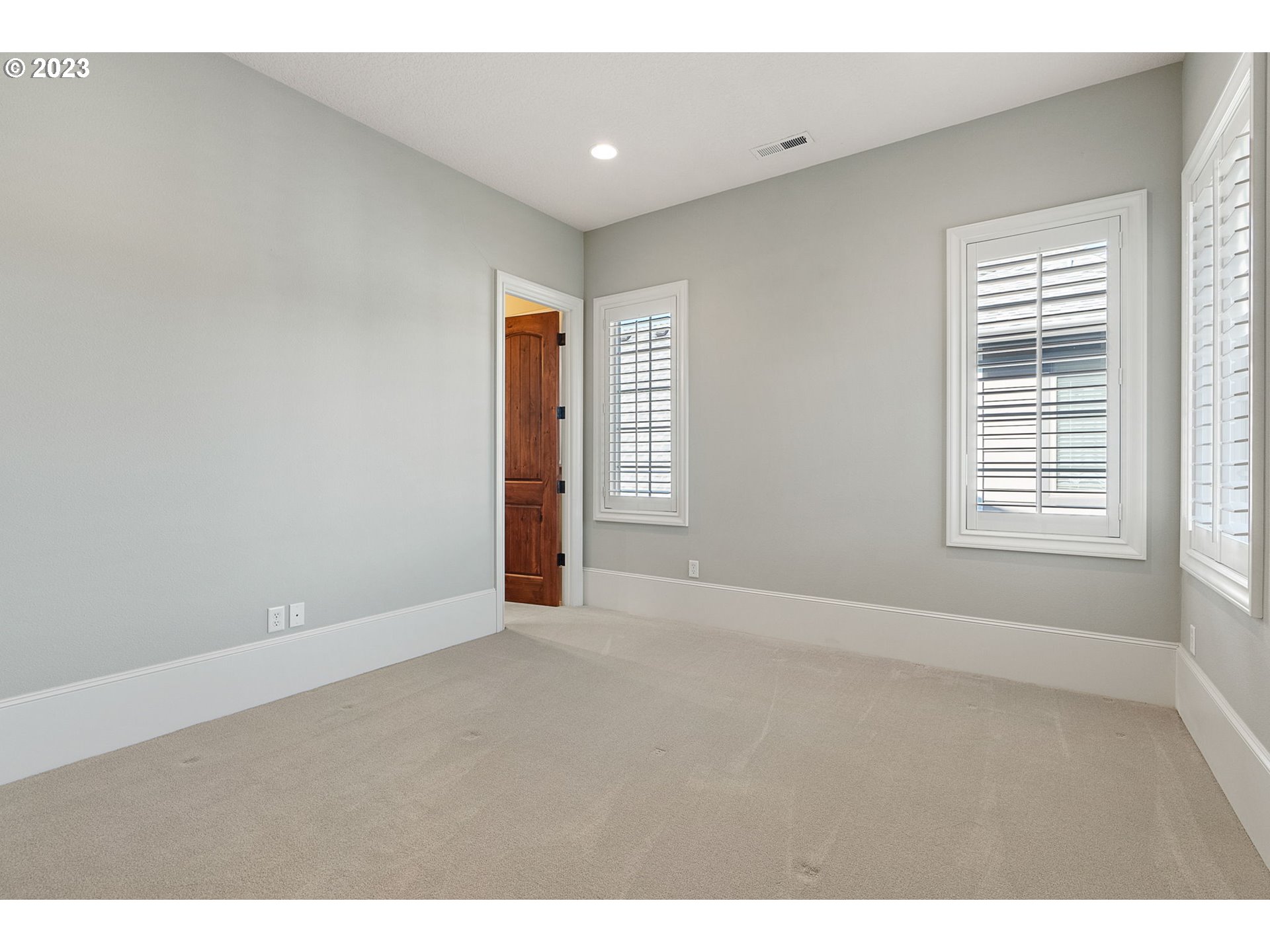 693 Southwest 68th Terrace Portland, OR 97225 - Photo 42 of 48 a view of an empty room with a window