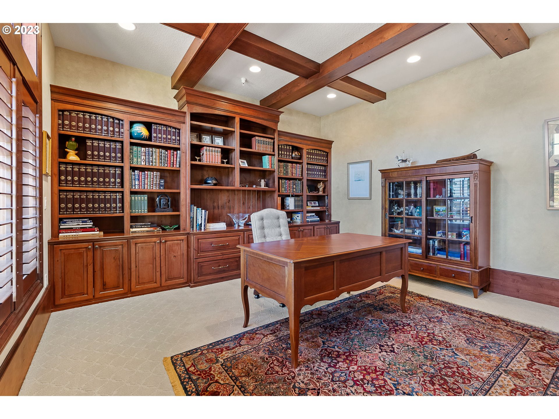 693 Southwest 68th Terrace Portland, OR 97225 - Photo 7 of 48 a living room with furniture a bookshelf and a bookshelf