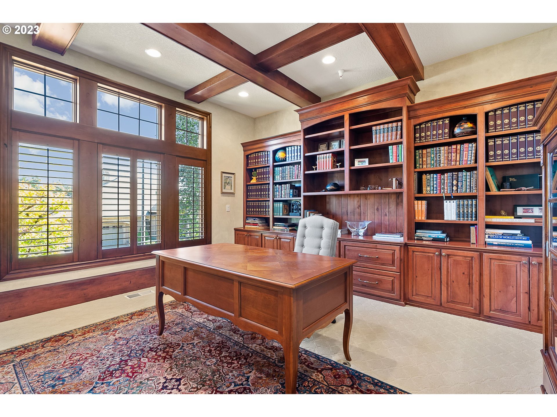 693 Southwest 68th Terrace Portland, OR 97225 - Photo 8 of 48 a room with bookshelf and a large window