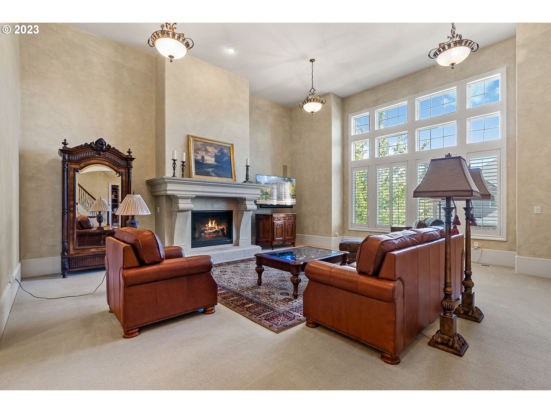 693 Southwest 68th Terrace Portland, OR 97225 - Photo 10 of 48 a living room with furniture and a fireplace