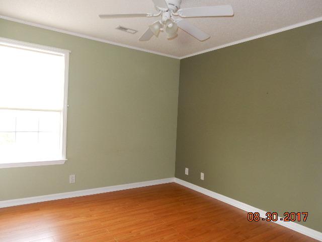 261 7 Mile Ferry Road Cunningham, TN 37052 - Photo 17 of 24 an empty room with a window and a fan