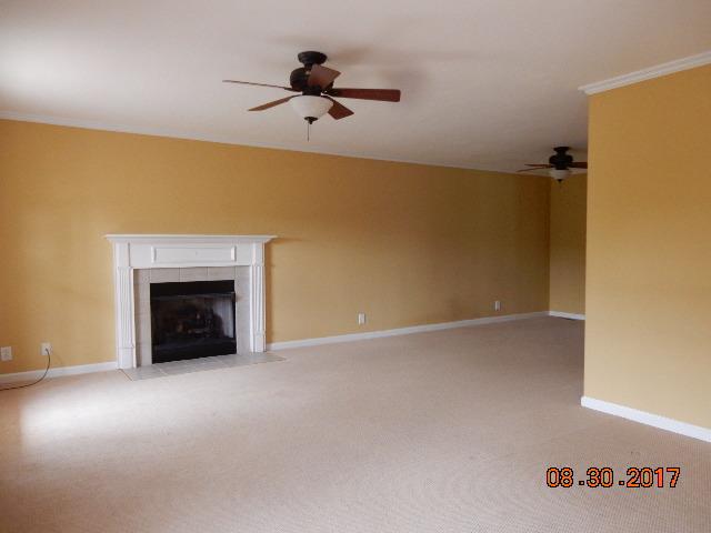 261 7 Mile Ferry Road Cunningham, TN 37052 - Photo 3 of 24 a view of an empty room with a fireplace