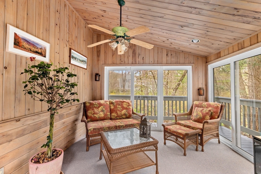 14 Camelot Drive Hingham, MA 02043 - Photo 14 of 34 a living room with furniture and a large window
