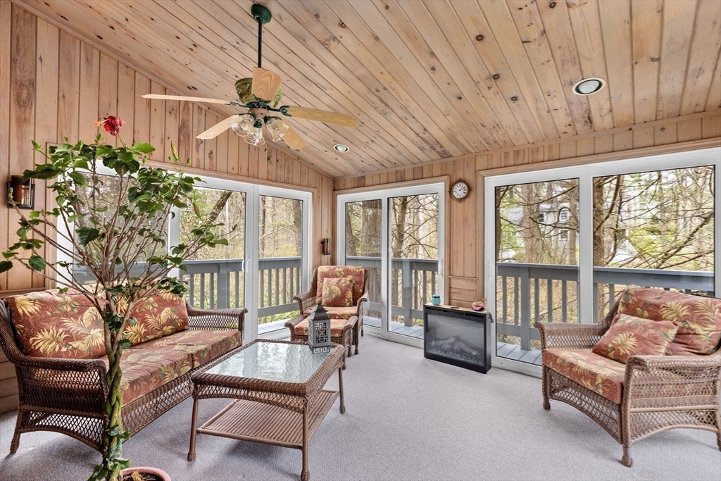 14 Camelot Drive Hingham, MA 02043 - Photo 15 of 34 a living room with furniture and a large window