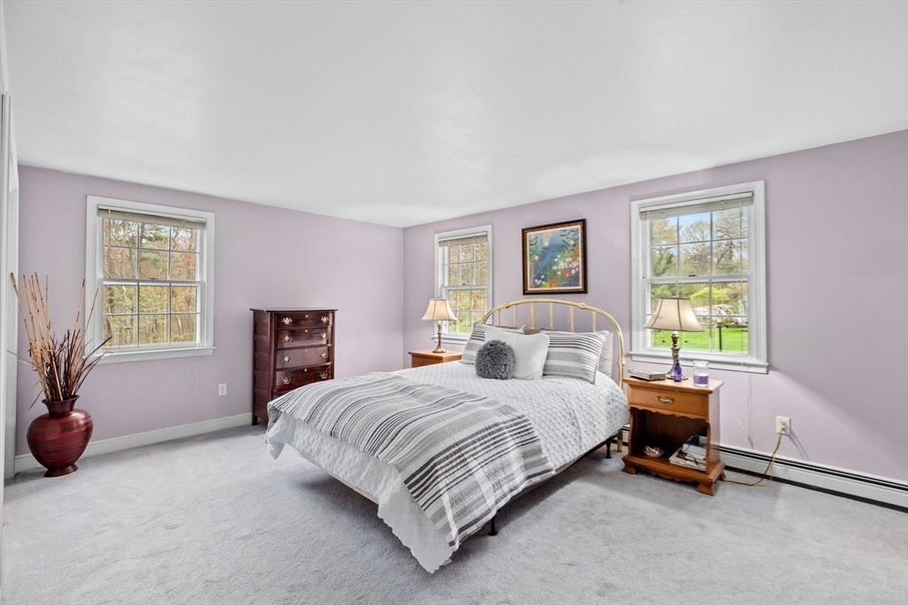 14 Camelot Drive Hingham, MA 02043 - Photo 17 of 34 a bedroom with a bed and a window