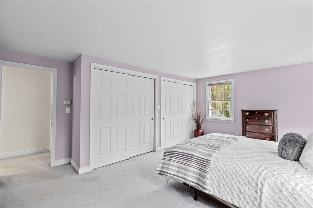 14 Camelot Drive Hingham, MA 02043 - Photo 19 of 34 a bedroom with a bed and a television