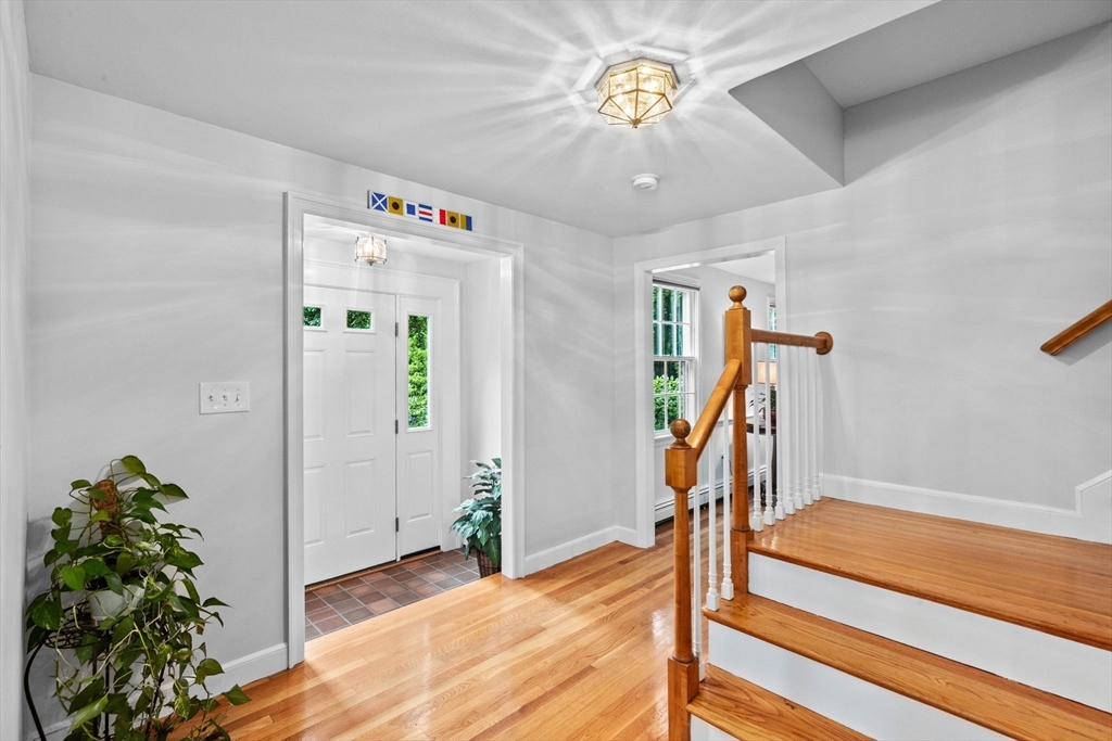 14 Camelot Drive Hingham, MA 02043 - Photo 2 of 34 a view of a hallway with a workspace