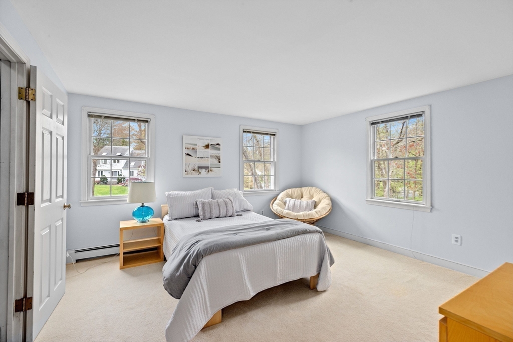 14 Camelot Drive Hingham, MA 02043 - Photo 21 of 34 a bedroom with bed and a window