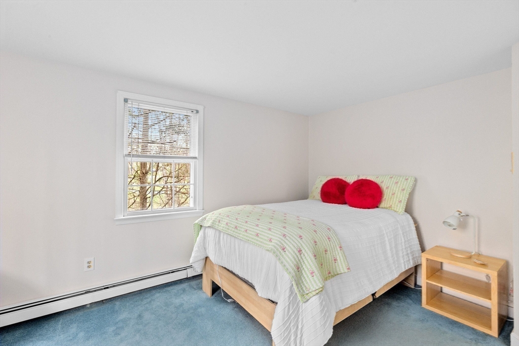 14 Camelot Drive Hingham, MA 02043 - Photo 24 of 34 a bedroom with a bed and a window
