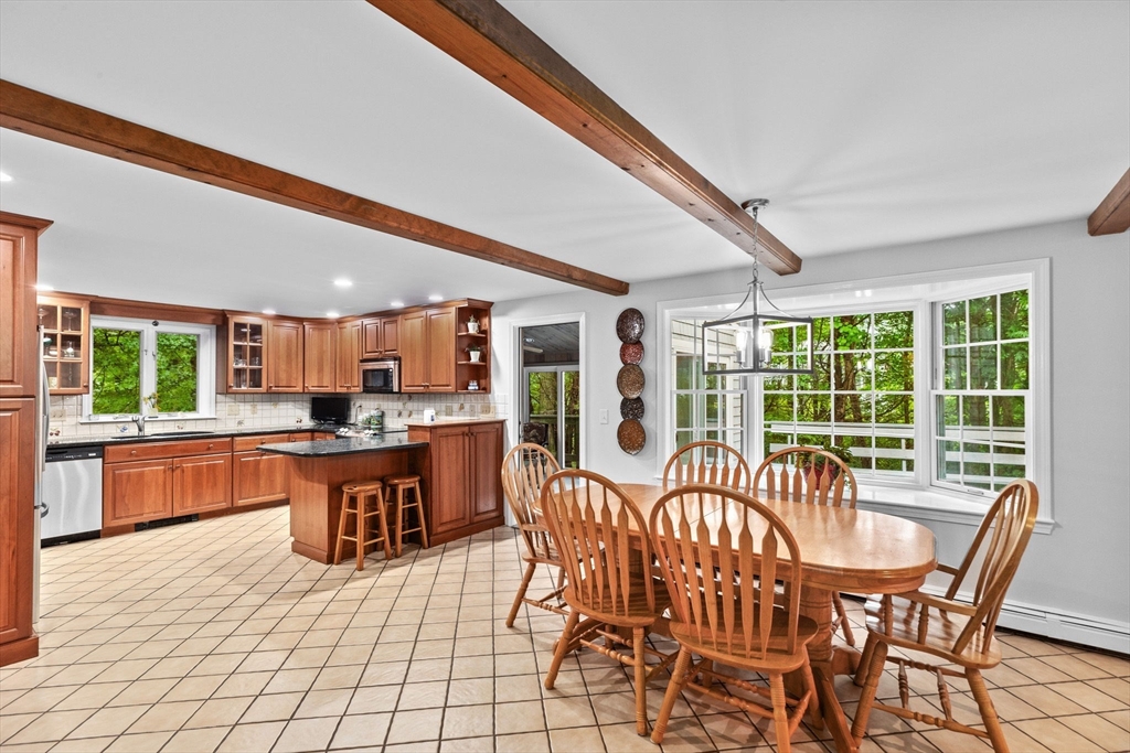 14 Camelot Drive Hingham, MA 02043 - Photo 5 of 34 a view of a dining room with furniture window and outside view