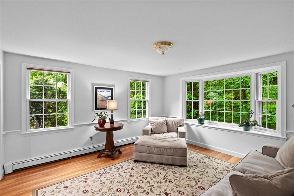 14 Camelot Drive Hingham, MA 02043 - Photo 8 of 34 a living room with furniture and a large window