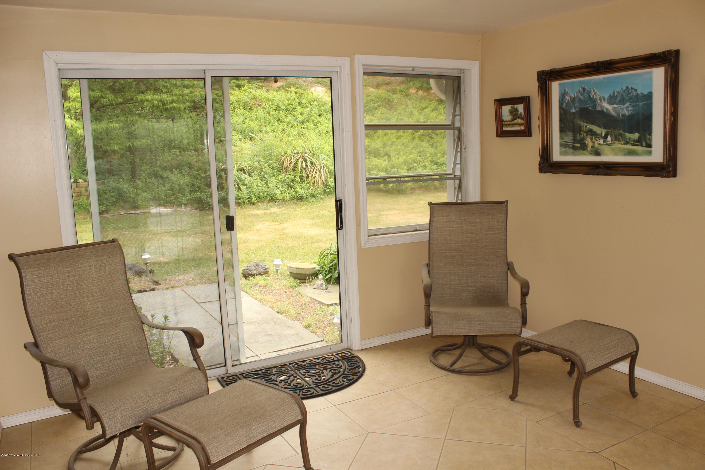 12 Bay Hill Road Middletown, NJ 07737 - Photo 3 of 30 a view of a room with furniture and a window