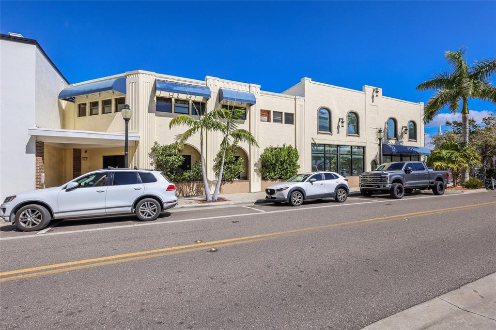 1565 State Street Sarasota, FL 34236 - Photo 3 of 8 a view of a cars park in front of a building