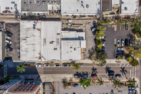 an aerial view of a house with outdoor space
