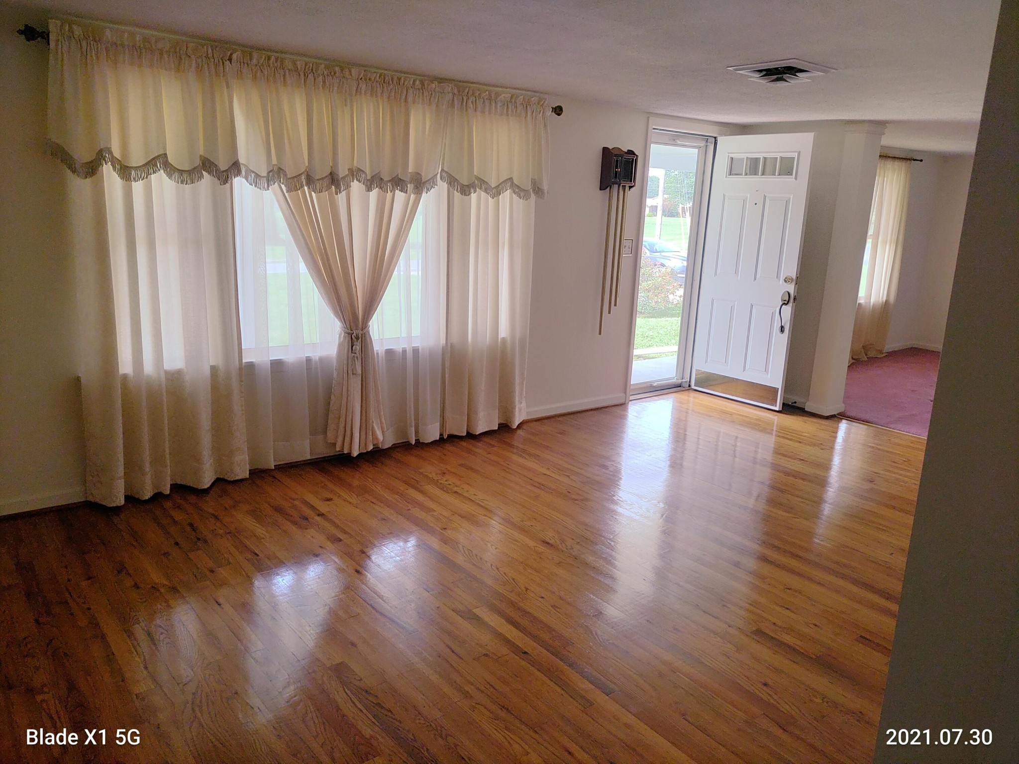 1764 Plateau Road Crossville, TN 38571 - Photo 3 of 38 an empty room with wooden floor and windows
