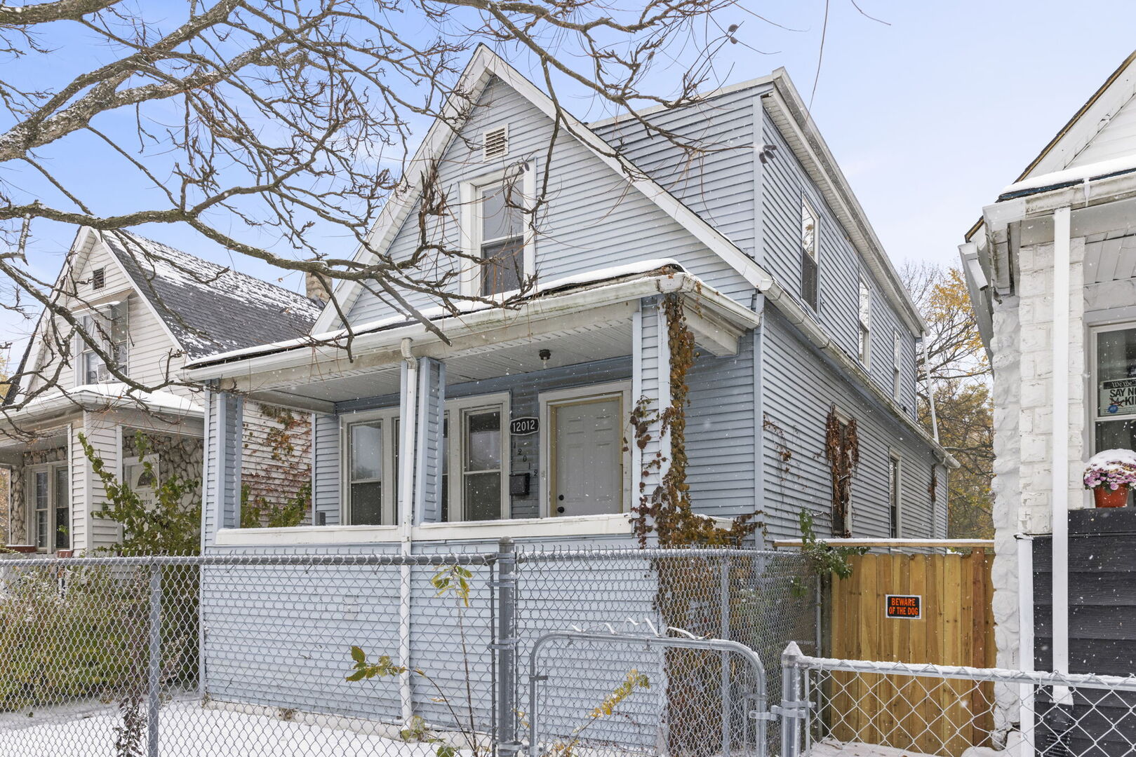 12012 South Michigan Avenue Chicago, IL 60628 - Photo 24 of 28 a view of a brick house with large windows