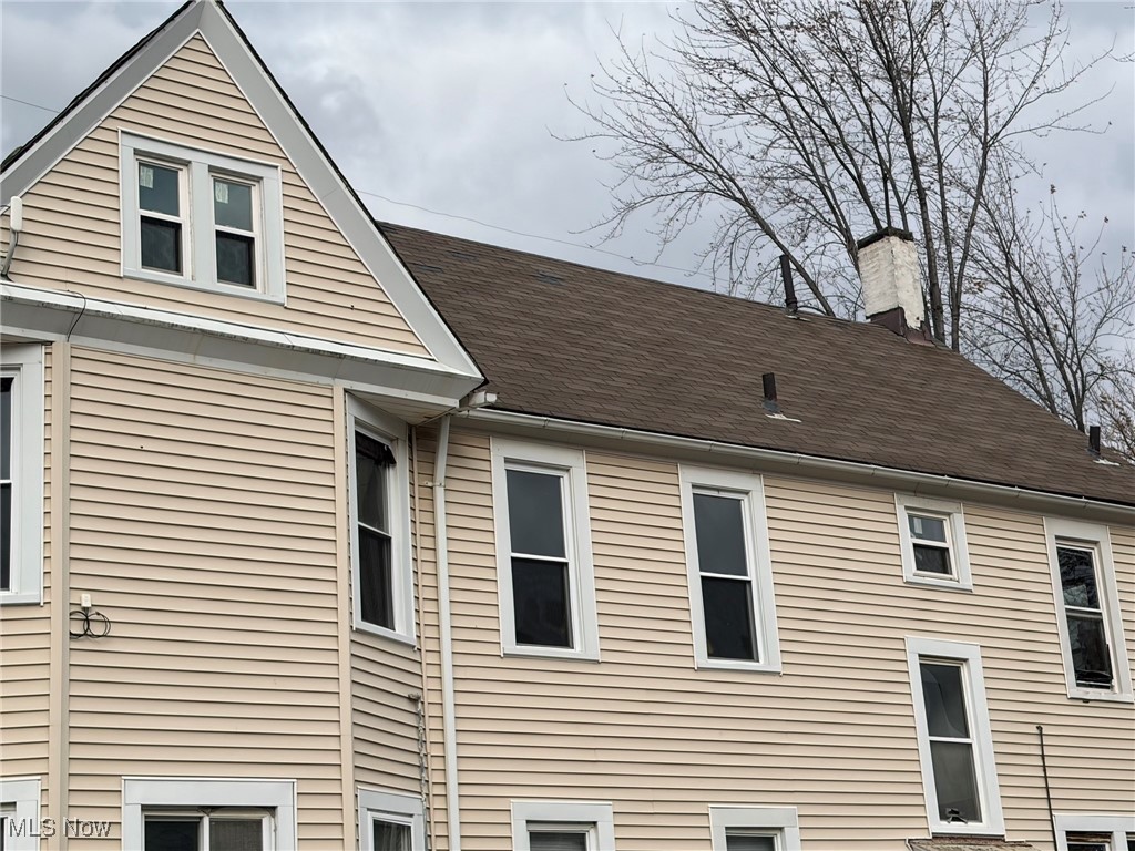 1355 Addison Road Cleveland, OH 44103 - Photo 19 of 23 View of property exterior with a chimney