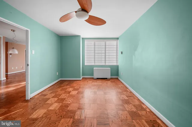 a view of an empty room and window