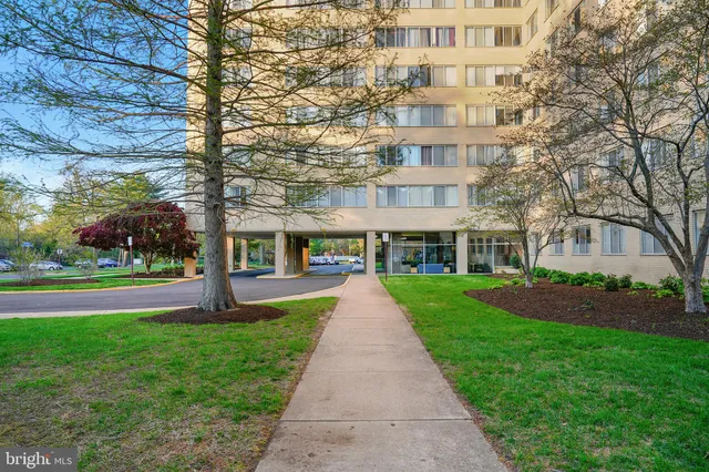 front view of a building with a yard