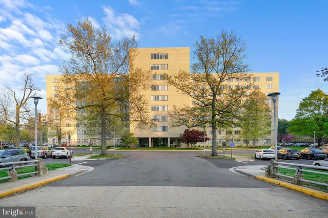 a view of a building with a street