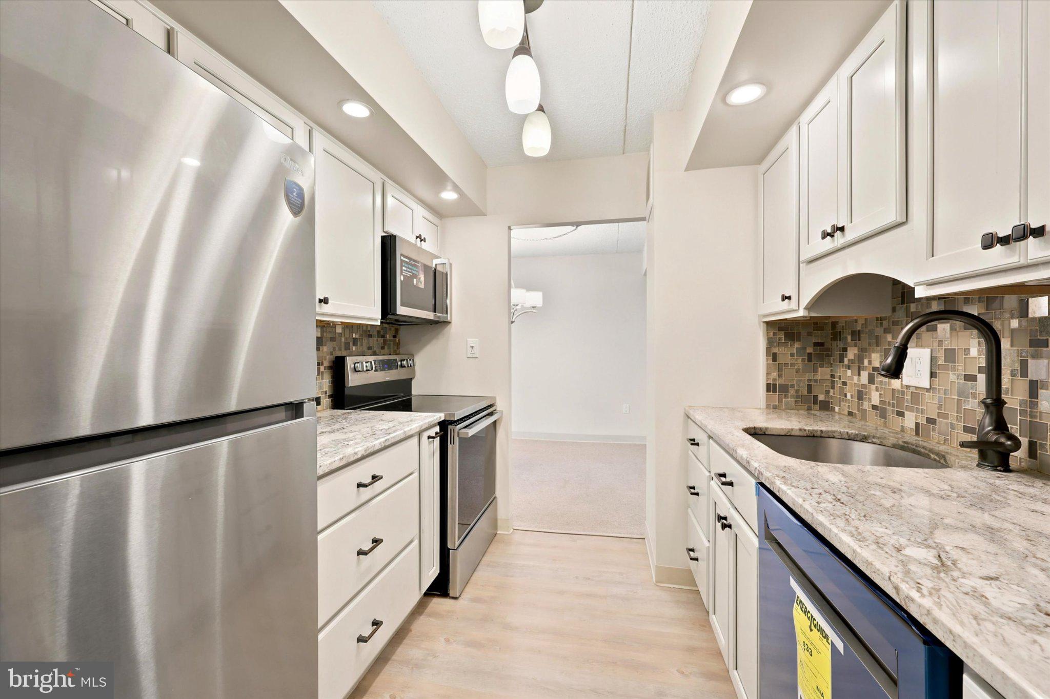 800 Avondale Road, Unit 2K Wallingford, PA 19086 - Photo 9 of 44 Modern kitchen with Brand New Appliances