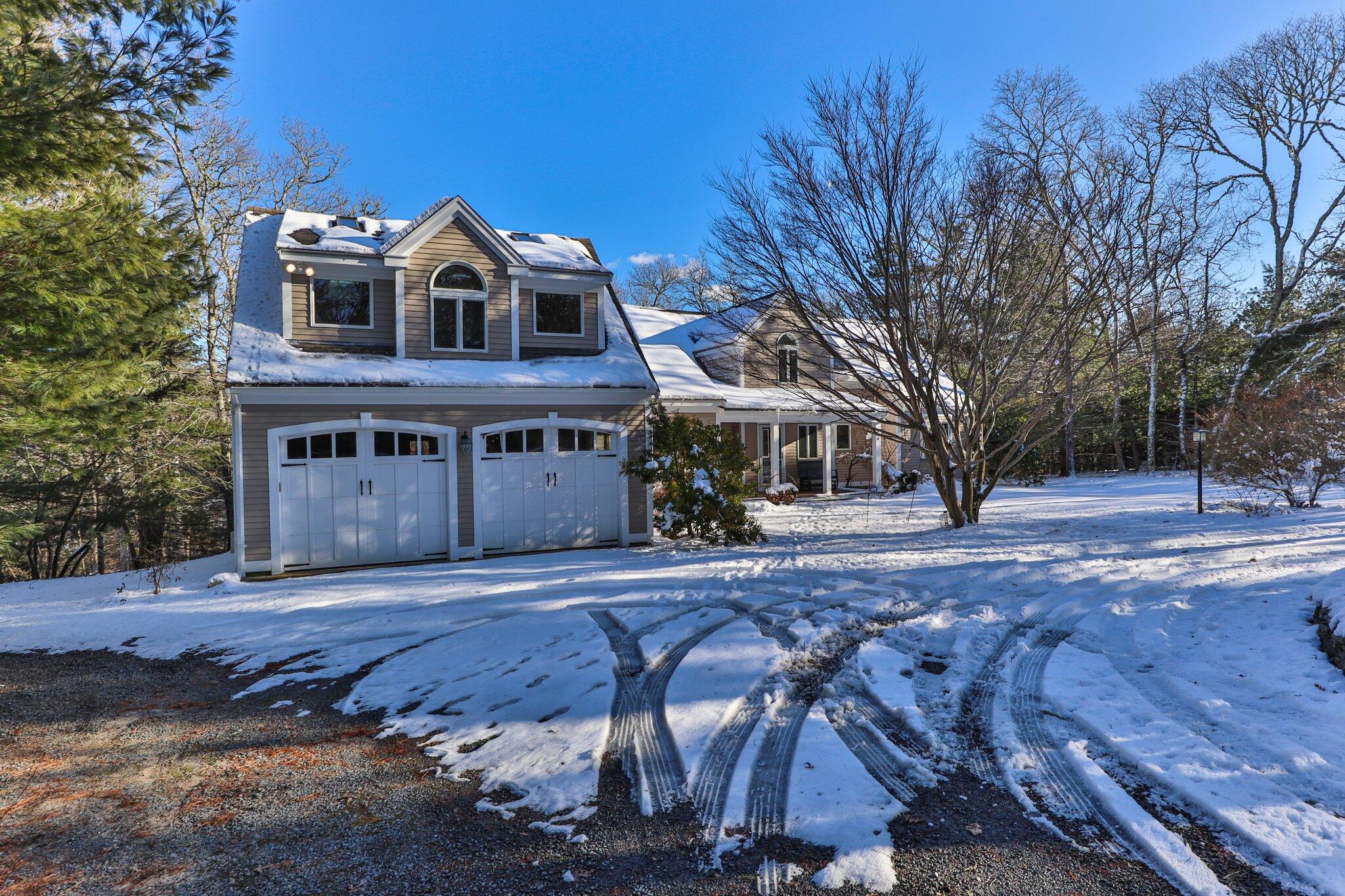 244 Santuit Road Cotuit, MA 02635 - Photo 4 of 58 a front view of a house with a yard