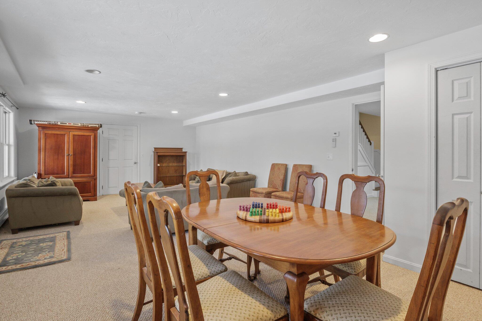 244 Santuit Road Cotuit, MA 02635 - Photo 49 of 58 a view of a dining room with furniture