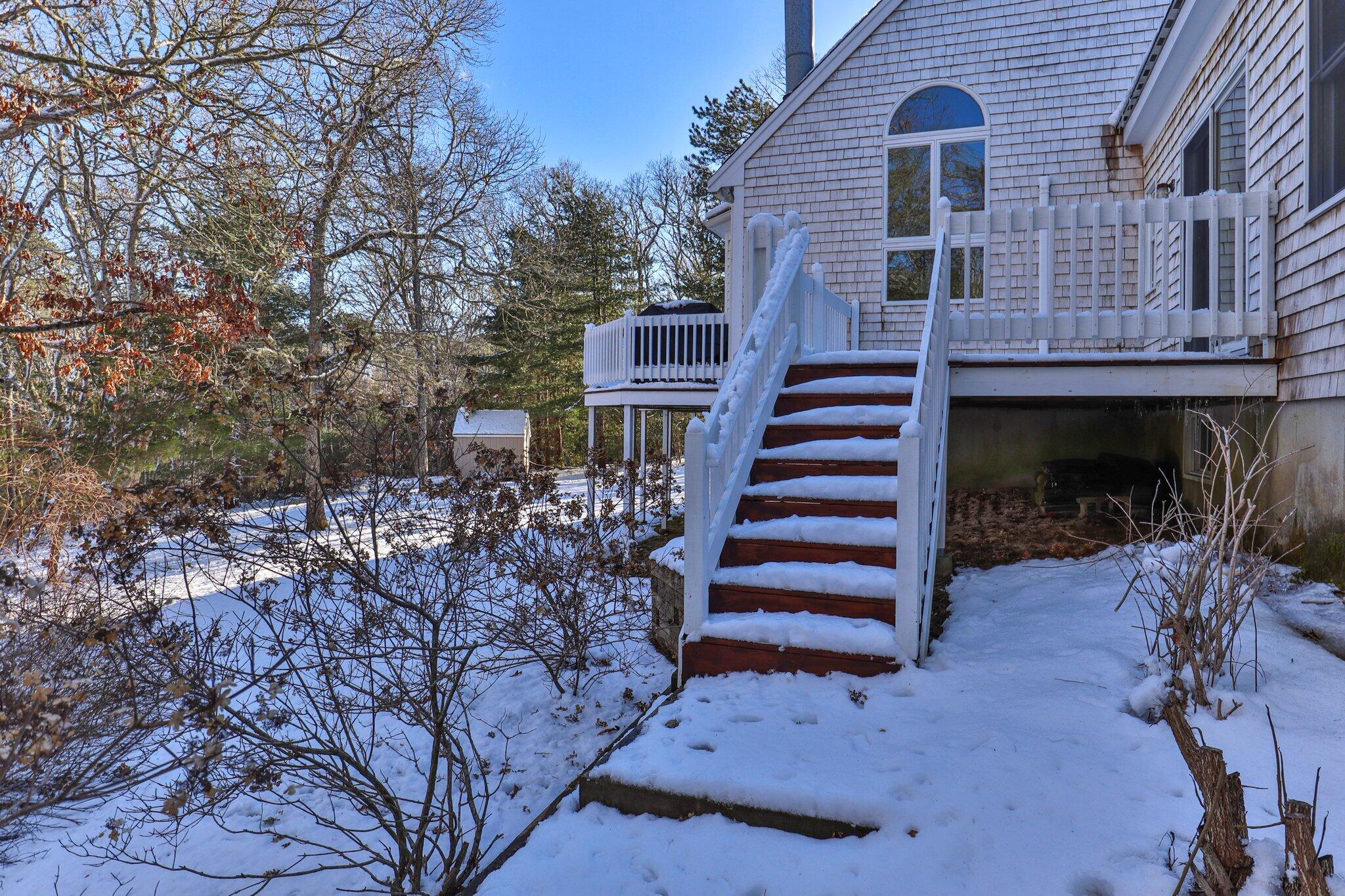 244 Santuit Road Cotuit, MA 02635 - Photo 54 of 58 a view of a house with a yard and stairs
