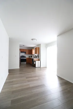 a view of a livingroom with wooden floor