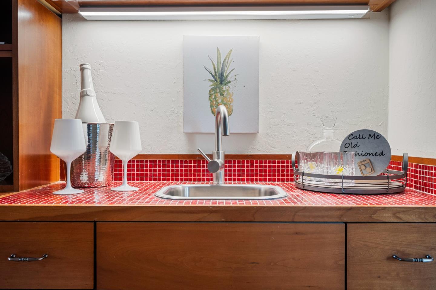 110 Park Road, Unit 103 Burlingame, CA 94010 - Photo 19 of 48 a bathroom with a sink and a mirror