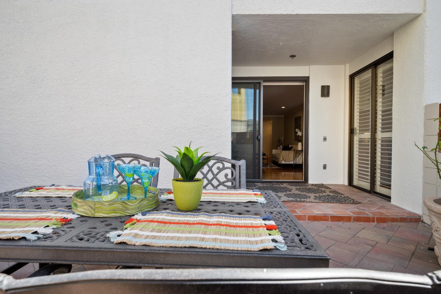 110 Park Road, Unit 103 Burlingame, CA 94010 - Photo 31 of 48 a front view of a house with a fountain