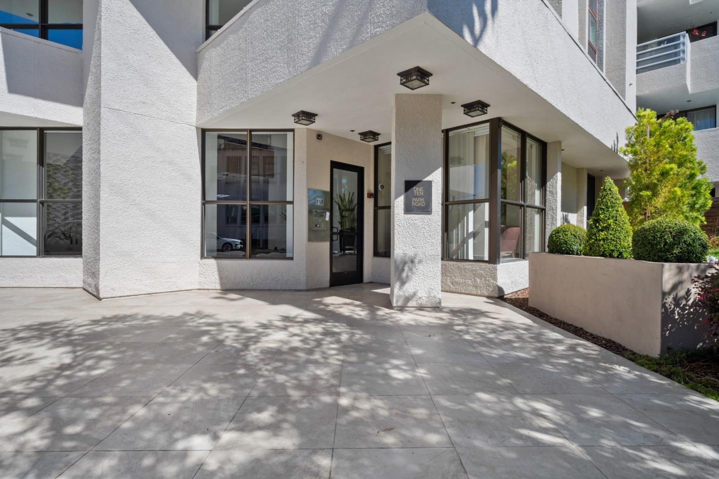110 Park Road, Unit 103 Burlingame, CA 94010 - Photo 41 of 48 a view of a house with a sitting area