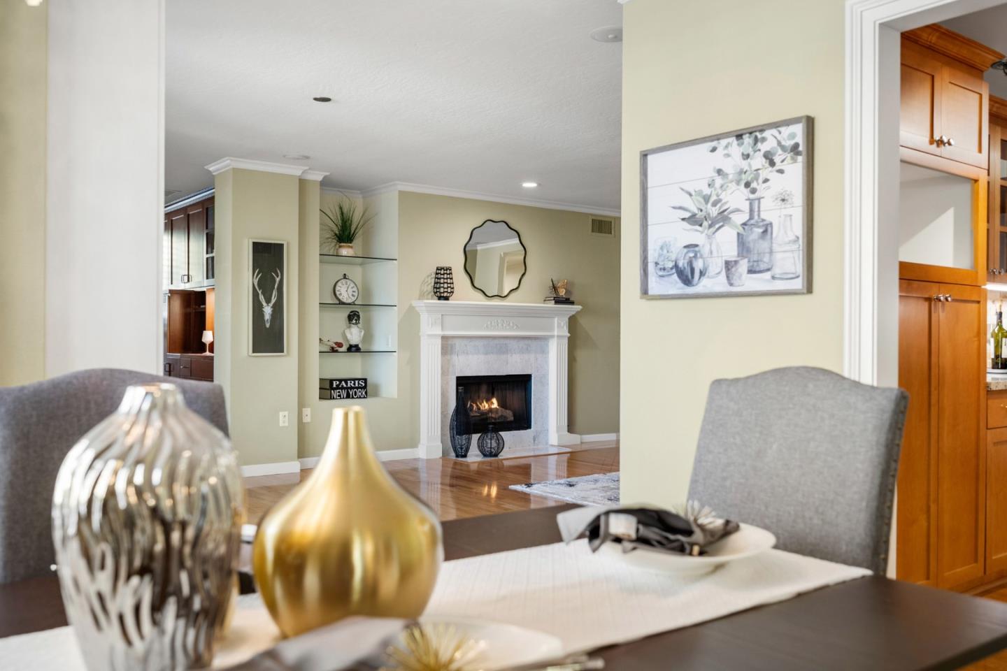 110 Park Road, Unit 103 Burlingame, CA 94010 - Photo 7 of 48 a living room with furniture and a fireplace
